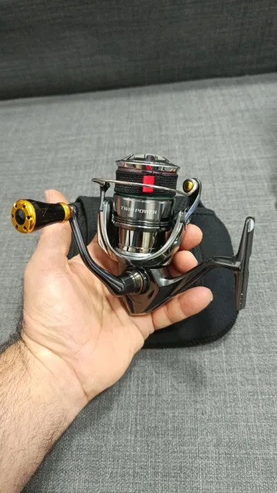Кноб тюнінговий Gomexus (чорний/золото, для Shimano/Daiwa, новий)