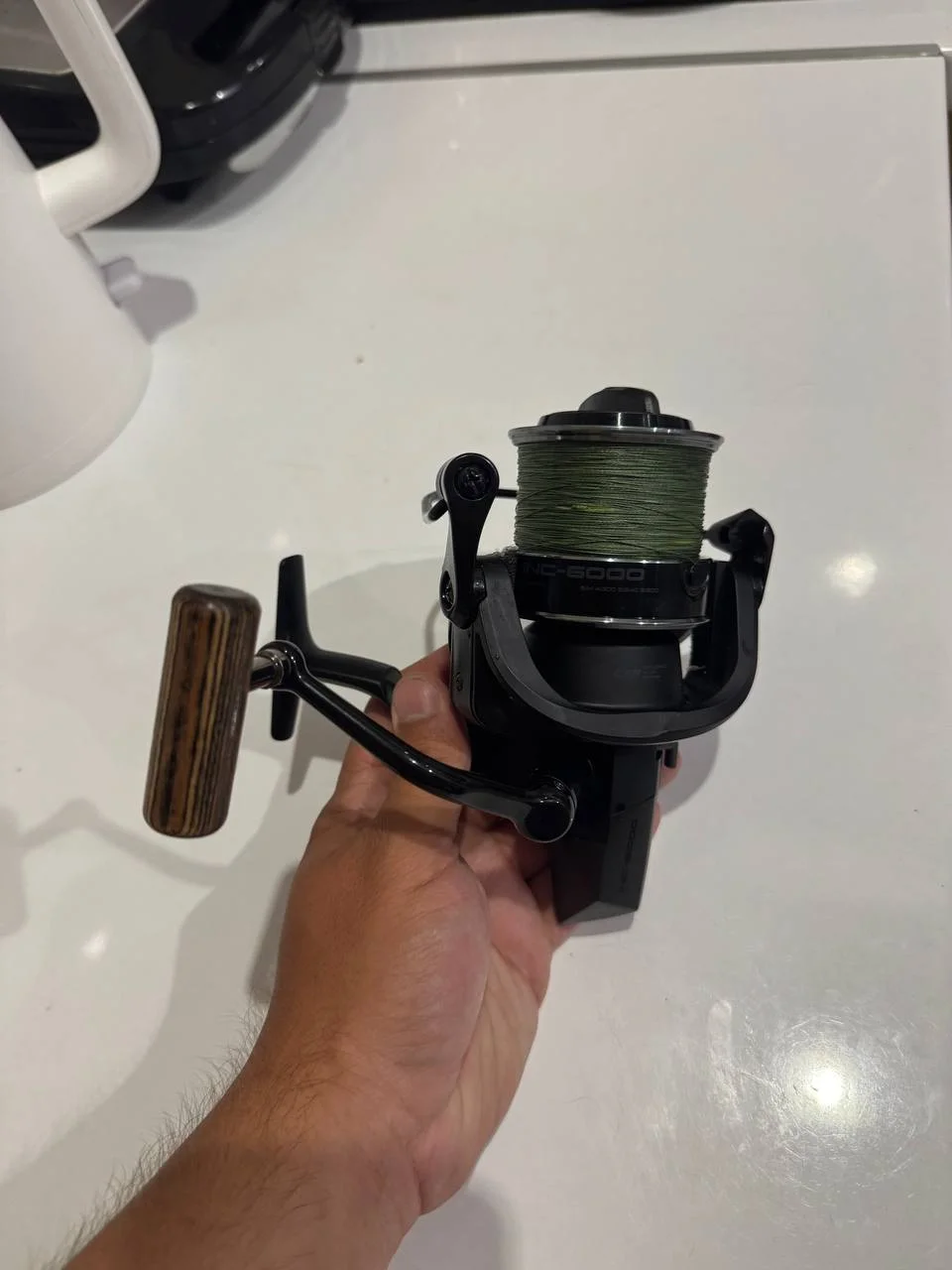 Коропова котушка Okuma INC-6000 (з жилкою та шок-лідером, одна тестова рибалка)