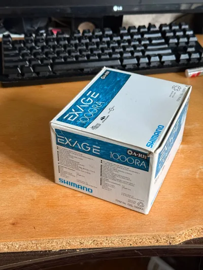Котушка Shimano Exage 1000 RA (задній фрикціон, обслужена, зі шнуром 34 Surpass II #0.25)
