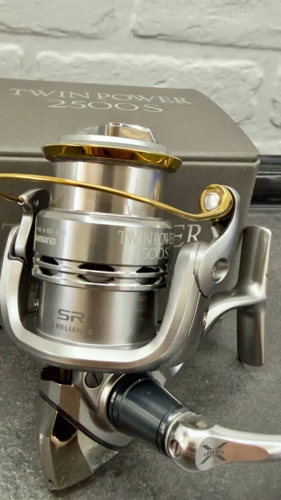 Котушка Shimano 11 Twin Power 2500S (капсула часу)